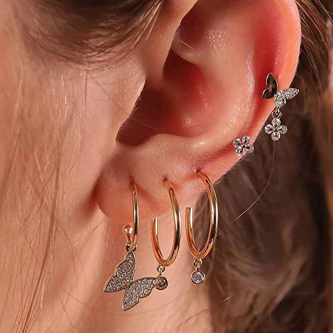 Close-up of RELOVET Butterfly Earrings Set in woman's ear