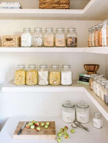 Pantry shelf with jars holding different items